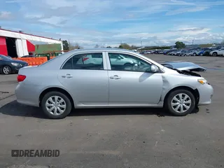 2009 Toyota Corolla with VIN JTDBL40E59J051651, listed as a IAAI auction lot 41874710 with 52,938 mi miles. Bid and sale history available at carsss.com. Image 13.