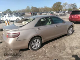2007 Toyota Camry CE with VIN 4T1BE46K77U574068, listed as a IAAI auction lot 41934219 with 287,702 mi miles. Bid and sale history available at carsss.com. Image 4.
