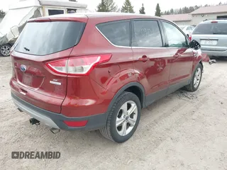2014 Ford Escape SE with VIN 1FMCU0GX4EUA93413, listed as a IAAI auction lot 42060910 with 132,515 mi miles. Bid and sale history available at carsss.com. Image 4.