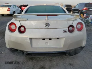 2012 Nissan GT-R Premium z VIN JN1AR5EF3CM251325, wystawiony jako Copart lot #77342524 z przebiegiem 70 923 mil mil oraz Szkoda całkowita • Salvage title. Historia ofert i sprzedaży dostępna na DreamBid. Obrazek 6.