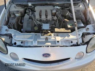 1996 Ford Taurus LX with VIN 1FALP53S9TG173438, listed as a Copart auction lot 77232114 with 89,789 mi miles and Clean title. Bid and sale history available at DreamBid. Image 11.