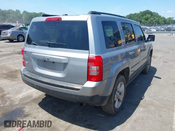2015 Jeep Patriot Sport with VIN 1C4NJRBBXFD291890, listed as a IAAI auction lot 42570079 with 204,455 mi miles and . Bid and sale history available at DreamBid. Image 4.