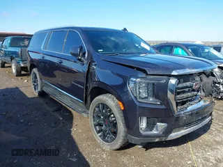 2022 GMC Yukon XL SLT with VIN 1GKS2GKDXNR134694, listed as a IAAI auction lot 41475723 with 52,579 mi miles. Bid and sale history available at carsss.com. Image 1.
