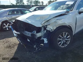 2019 Mazda CX-9 Touring with VIN JM3TCBCYXK0332409, listed as a IAAI auction lot 41567494 with 58,395 mi miles. Bid and sale history available at carsss.com. Image 6.