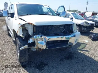 2005 Nissan Titan LE with VIN 1N6AA07B65N506688, listed as a IAAI auction lot 42086502 with 245,661 mi miles and . Bid and sale history available at DreamBid. Image 6.
