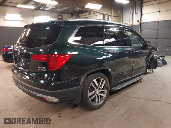 2016 Honda Pilot Touring with VIN 5FNYF6H98GB035226, listed as a IAAI auction lot 42022957 with 103,842 mi miles and . Bid and sale history available at DreamBid. Image 4.