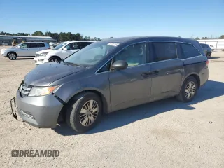 2015 Honda Odyssey LX with VIN 5FNRL5H29FB117569, listed as a Copart auction lot 87870755 with 147,295 mi miles and Salvage Title. Bid and sale history available at DreamBid. Image 1.