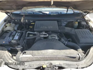 1999 Jeep Grand Cherokee Limited with VIN 1J4GW68N5XC549051, listed as a Copart auction lot 64376325 with 205,276 mi miles and Clean title. Bid and sale history available at DreamBid. Image 12.