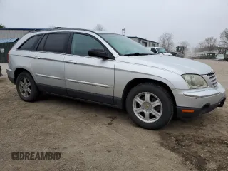 2004 Chrysler Pacifica z VIN 2C8GF68474R296233, wystawiony jako Copart lot #48990085 z przebiegiem 200 234 mil mil oraz Czysty tytuł • Clean title. Historia ofert i sprzedaży dostępna na DreamBid. Obrazek 4.