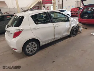 2012 Toyota Yaris L with VIN JTDKTUD38CD507480, listed as a IAAI auction lot 41299057 with 170,675 mi miles. Bid and sale history available at carsss.com. Image 4.
