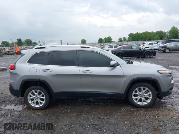2018 Jeep Cherokee Latitude Plus with VIN 1C4PJLLB9JD590607, listed as a IAAI auction lot 42489554 with 168,116 mi miles and . Bid and sale history available at DreamBid. Image 13.