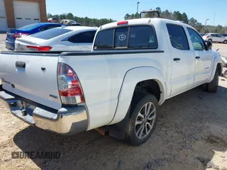 2013 Toyota Tacoma with VIN 5TFJX4CN5DX030249, listed as a IAAI auction lot 41810560 with 177,680 mi miles and . Bid and sale history available at DreamBid. Image 4.