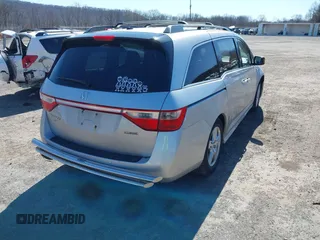 2012 Honda Odyssey Touring with VIN 5FNRL5H93CB042392, listed as a IAAI auction lot 41859533 with 169,141 mi miles. Bid and sale history available at carsss.com. Image 4.
