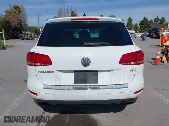 2012 Volkswagen Touareg Sport with VIN WVGEF9BP5CD007294, listed as a IAAI auction lot 41841268 with 160,883 mi miles and . Bid and sale history available at DreamBid. Image 16.