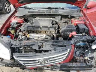 2009 Kia Spectra SX with VIN KNAFE222495661159, listed as a Copart auction lot 42604295 with 123,934 mi miles and Salvage Title. Bid and sale history available at carsss.com. Image 11.
