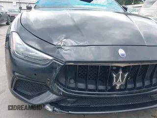 2019 Maserati Ghibli S Q4 GranSport z VIN ZAM57YTS5K1313261, wystawiony jako IAAI lot #42148257 z przebiegiem 47 282 mil mil oraz . Historia ofert i sprzedaży dostępna na DreamBid. Obrazek 6.