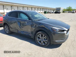 2024 Mazda CX-30 S Premium with VIN 3MVDMBDM7RM695181, listed as a Copart auction lot 54154095 with 29,249 mi miles and Salvage title. Bid and sale history available at DreamBid. Image 4.
