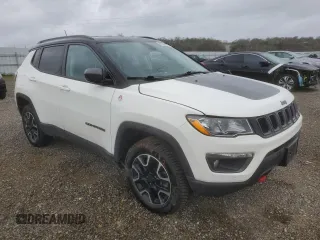 2019 Jeep Compass Trailhawk with VIN 3C4NJDDB4KT790351, listed as a Copart auction lot 48588285 with 67,417 mi miles and Salvage Title. Bid and sale history available at DreamBid. Image 4.