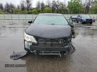 2012 Toyota Camry XLE z VIN 4T1BD1FK8CU001921, wystawiony jako Copart lot #57861715 z przebiegiem Nie podano mil oraz Szkoda całkowita • Salvage title. Historia ofert i sprzedaży dostępna na DreamBid. Obrazek 5.