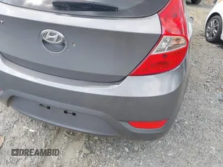 2014 Hyundai Accent GS with VIN KMHCT5AE3EU141605, listed as a IAAI auction lot 42157550 with 174,197 mi miles. Bid and sale history available at carsss.com. Image 6.