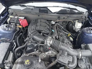 2012 Ford Mustang V6 Premium with VIN 1ZVBP8AM7C5268553, listed as a IAAI auction lot 41715730 with 97,848 mi miles. Bid and sale history available at carsss.com. Image 10.