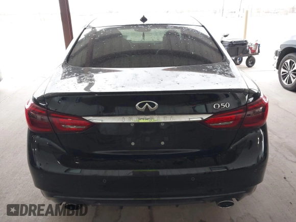 2023 Infiniti Q50 Luxe with VIN JN1EV7BPXPM512588, listed as a IAAI auction lot 41819661 with 30,817 mi miles and . Bid and sale history available at DreamBid. Image 16.