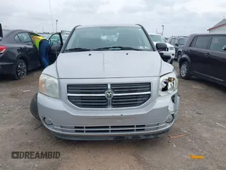 2011 Dodge Caliber Mainstreet with VIN 1B3CB3HA2BD238032, listed as a IAAI auction lot 41865918 with 98,022 mi miles and . Bid and sale history available at DreamBid. Image 12.