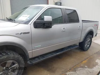 2013 Ford F-150 XL with VIN 1FTFW1ET6DFA79047, listed as a IAAI auction lot 42047487 with 192,395 mi miles. Bid and sale history available at carsss.com. Image 14.