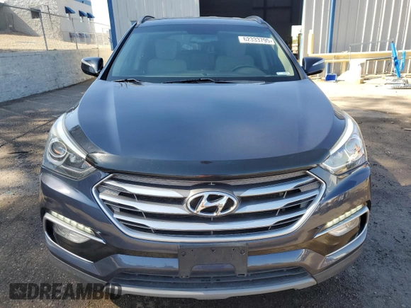 2018 Hyundai Santa Fe 2.4L с VIN 5NMZUDLB6JH097285, выставлен на аукционе Copart как лот 62333795 с пробегом 90 476 миль миль и Списание • Salvage title. История ставок и продаж доступна на DreamBid. Изображение 5.
