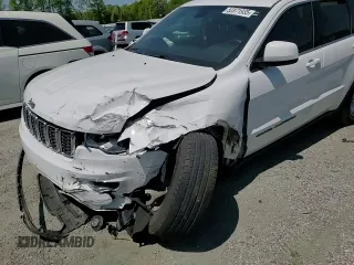 2019 Jeep Grand Cherokee Altitude with VIN 1C4RJEAG9KC662240, listed as a Copart auction lot 52871935 with 123,188 mi miles and Salvage title. Bid and sale history available at DreamBid. Image 12.