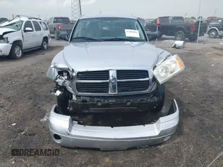 2007 Dodge Dakota SLT with VIN 1D7HE48KX7S122712, listed as a IAAI auction lot 41888864 with 114,384 mi miles and . Bid and sale history available at carsss.com. Image 12.
