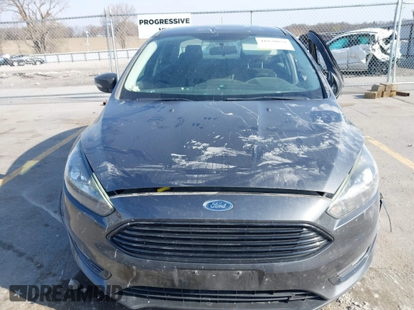 2016 Ford Focus SE with VIN 1FADP3F2XGL317130, listed as a IAAI auction lot 41970029 with 85,241 mi miles and . Bid and sale history available at DreamBid. Image 12.
