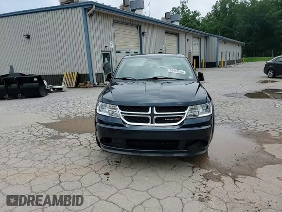 2013 Dodge Journey American Value with VIN 3C4PDCAB4DT581984, listed as a Copart auction lot 59953515 with 166,927 mi miles and Salvage title. Bid and sale history available at DreamBid. Image 15.