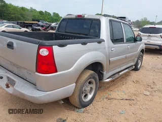 2003 Ford Explorer Sport Trac XLS z VIN 1FMZU67E53UC26334, wystawiony jako IAAI lot #42088444 z przebiegiem 175 922 mil mil oraz . Historia ofert i sprzedaży dostępna na DreamBid. Obrazek 4.