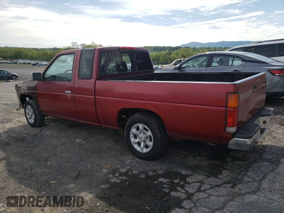 1996 Nissan Frontier XE with VIN 1N6SD16S8TC335129, listed as a Copart auction lot 55884495 with 313,757 mi miles and Salvage title. Bid and sale history available at DreamBid. Image 2.
