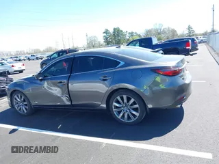 2020 Mazda 6 Grand Touring with VIN JM1GL1TY0L1522025, listed as a IAAI auction lot 41876429 with 68,101 mi miles and . Bid and sale history available at DreamBid. Image 14.