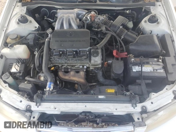 2001 Toyota Camry LE z VIN JT2BF22K310305858, wystawiony jako Copart lot #55231305 z przebiegiem 149 104 mil mil oraz Nie do naprawy • Non repairable. Historia ofert i sprzedaży dostępna na DreamBid. Obrazek 11.