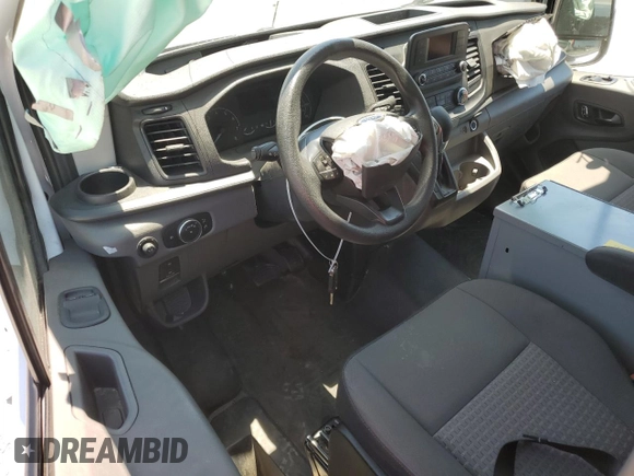 2023 Ford Transit Cargo z VIN 1FTBR1Y85PKB27419, wystawiony jako Copart lot #58053535 z przebiegiem Nie podano mil oraz Szkoda całkowita • Salvage title. Historia ofert i sprzedaży dostępna na DreamBid. Obrazek 8.