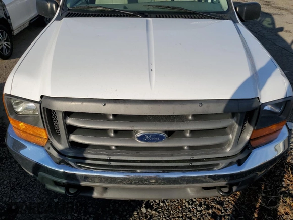 2001 Ford Super Duty F-250 XL with VIN 1FTNX21L51EA29472, listed as a Copart auction lot 77810274 with 241,055 mi miles and Salvage Title. Bid and sale history available at carsss.com. Image 11.