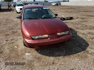 1999 Saturn SW z VIN 1G8ZK827XXZ348270, wystawiony jako Copart lot #67872244 z przebiegiem 110 936 mil mil oraz Szkody całkowita. Historia ofert i sprzedaży dostępna na DreamBid. Obrazek 12.