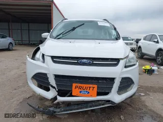2014 Ford Escape SE with VIN 1FMCU0GX7EUC29937, listed as a IAAI auction lot 41346669 with 99,297 mi miles. Bid and sale history available at carsss.com. Image 6.