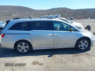 2012 Honda Odyssey Touring with VIN 5FNRL5H93CB042392, listed as a IAAI auction lot 41859533 with 169,141 mi miles. Bid and sale history available at carsss.com. Image 13.