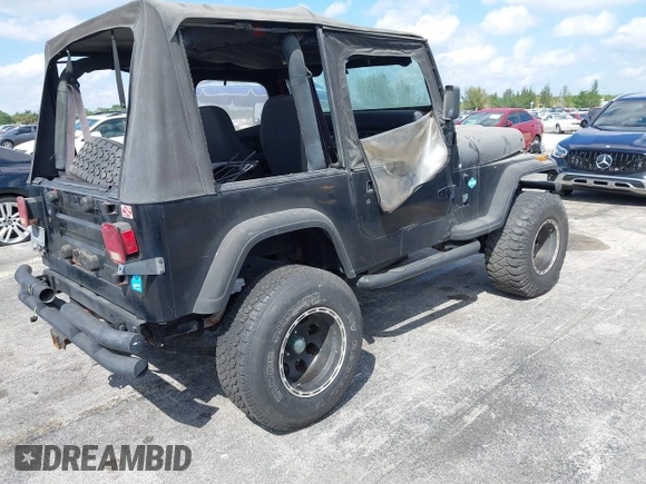 1994 Jeep Wrangler S with VIN 1J4FY19P7RP418580, listed as a IAAI auction lot 41899026 with 196,430 mi miles. Bid and sale history available at carsss.com. Image 4.