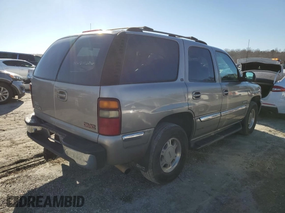 2001 GMC Yukon SLT z VIN 1GKEC13T71J223368, wystawiony jako Copart lot #86610954 z przebiegiem 414 811 mil mil oraz Szkoda całkowita • Salvage title. Historia ofert i sprzedaży dostępna na DreamBid. Obrazek 3.