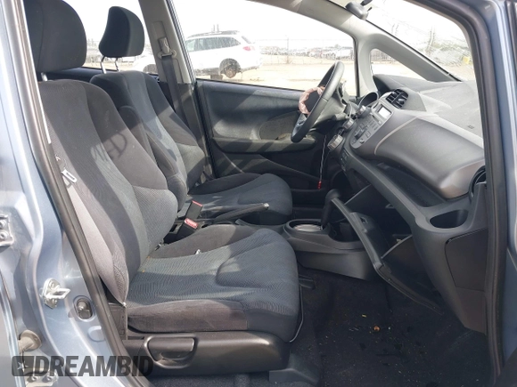2011 Honda Fit Sport with VIN JHMGE8H55BC007749, listed as a IAAI auction lot 42052064 with 76,081 mi miles and . Bid and sale history available at DreamBid. Image 5.