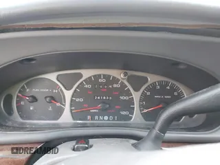 1999 Mercury Sable GS with VIN 1MEFM50U5XG633589, listed as a IAAI auction lot 41614442 with 241,833 mi miles. Bid and sale history available at carsss.com. Image 7.