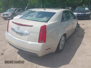 2011 Cadillac CTS Luxury z VIN 1G6DG5EY2B0161125, wystawiony jako IAAI lot #42205213 z przebiegiem 145 775 mil mil oraz . Historia ofert i sprzedaży dostępna na DreamBid. Obrazek 4.