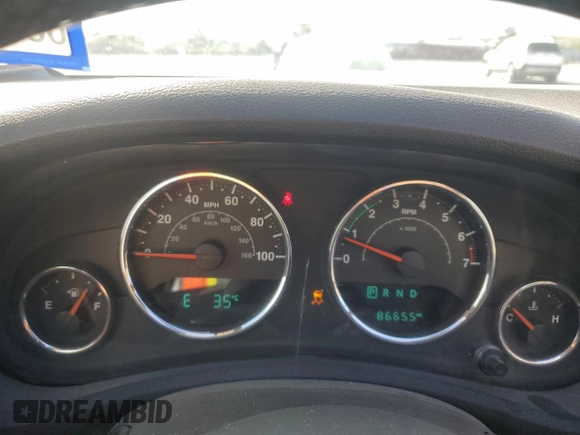 2015 Jeep Wrangler Sahara with VIN 1C4AJWBG5FL733795, listed as a Copart auction lot 61998255 with 86,655 mi miles and Salvage title. Bid and sale history available at DreamBid. Image 9.