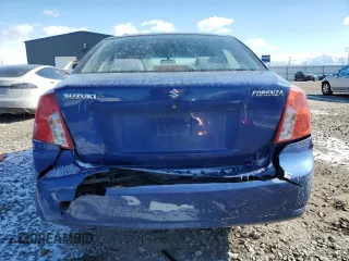 2006 Suzuki Forenza z VIN KL5JD56Z56K349704, wystawiony jako Copart lot #44724515 z przebiegiem Nie podano mil oraz Szkoda całkowita • Salvage title. Historia ofert i sprzedaży dostępna na DreamBid. Obrazek 6.