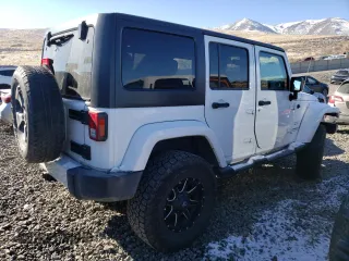2016 Jeep Wrangler Unlimited 75th Anniversary with VIN 1C4HJWEG3GL185999, listed as a Copart auction lot 42060225 with 112,769 mi miles and Salvage title. Bid and sale history available at DreamBid. Image 3.
